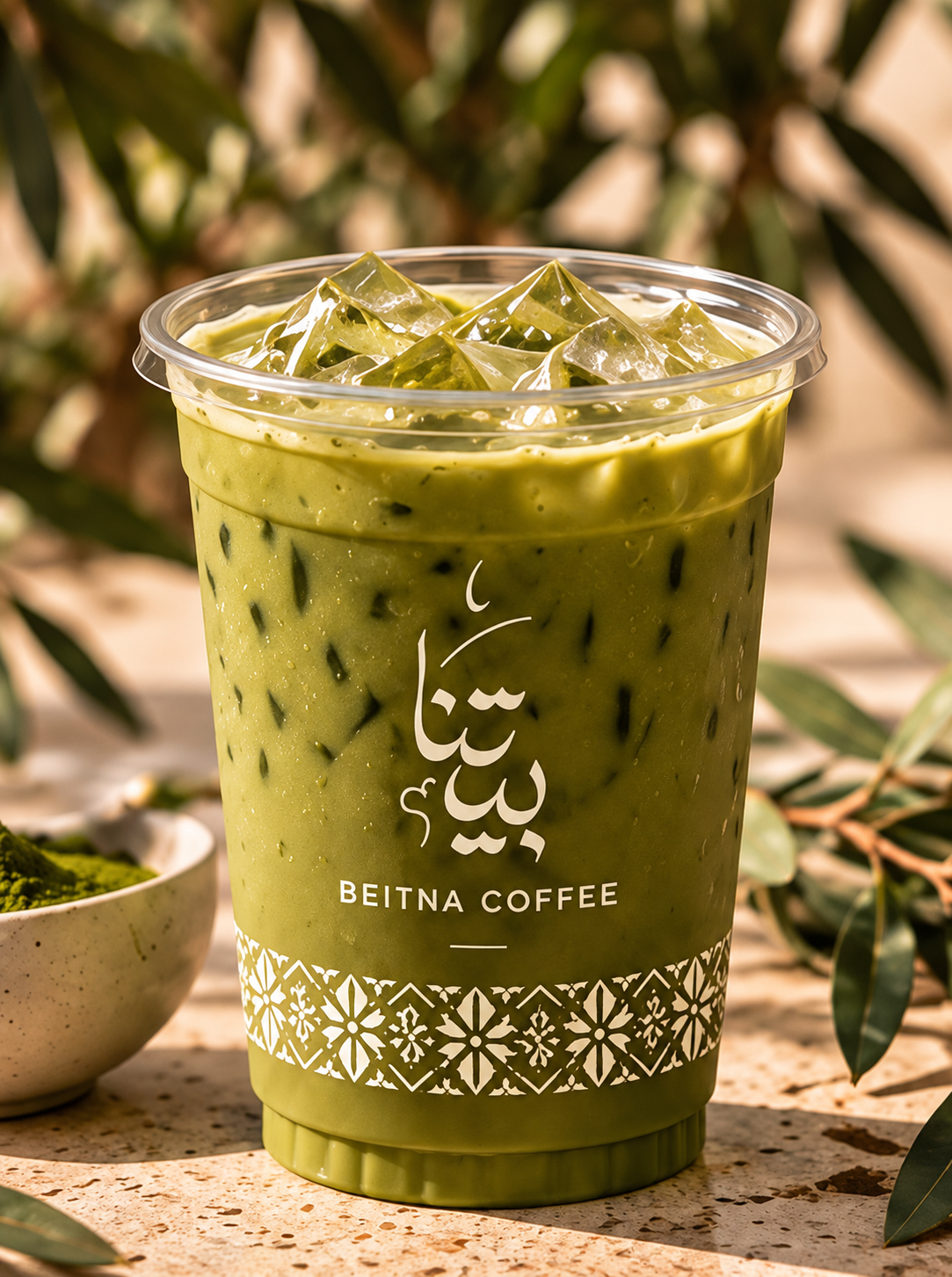 Iced matcha in a branded Beitna cup